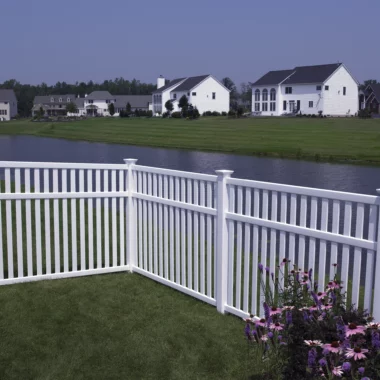 Norwalk closed picket fence in white around homes back yard