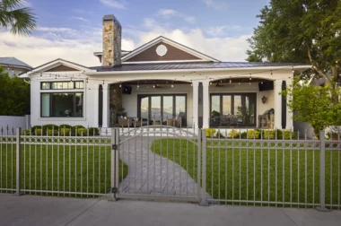 Orleans finial top picket fence with arched walk through gate
