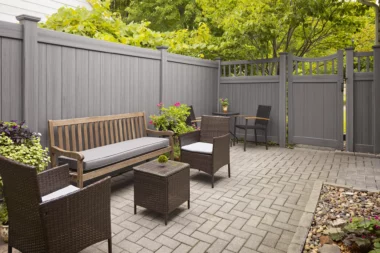 Newbury solid vertical privacy fence around outdoor lounge space