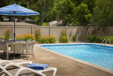 Newbury solid vertical privacy fence around back yard pool