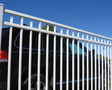 Salem alternating spear picket fence around parking area