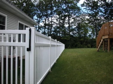 Norwalk Slim closed picket fence in white around back yard