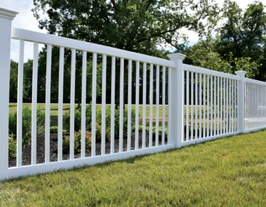 Norwalk Slim closed picket fence in white along property line