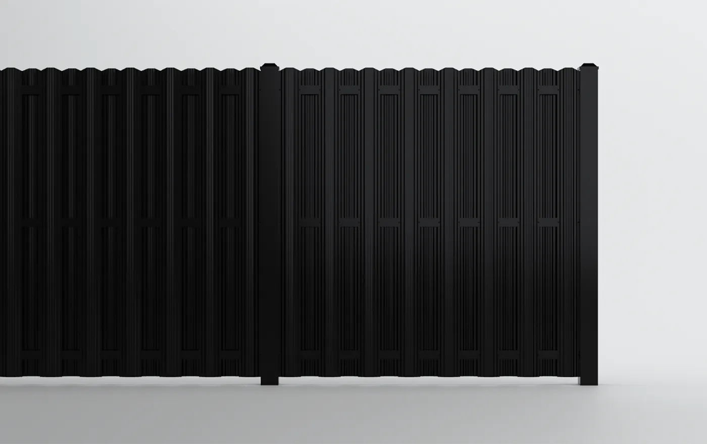 A black vertical panel fence with a modern design stands against a plain white background. The fence features tall, evenly spaced slats with a slight arch at the top of each section.