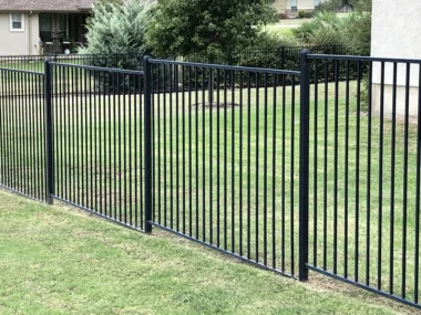 Westport flat top welded fence on sloped yard