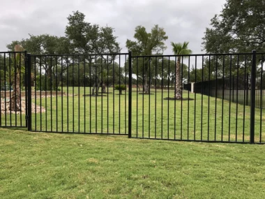 Westport flat top welded fence on sloped yard