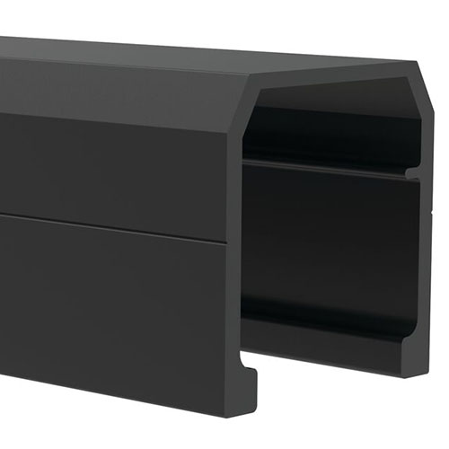 A close-up view of a black, hollow, metal rectangular profile with an open slot on one side and angled edges on the top.