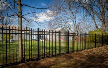 Georgetown spear top picket fence in black along property line