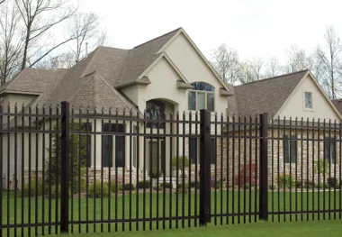 Georgetown spear top picket fence in black around home