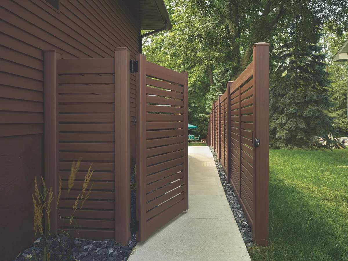 backyard entry gate through brown horizontal semi-privacy fence