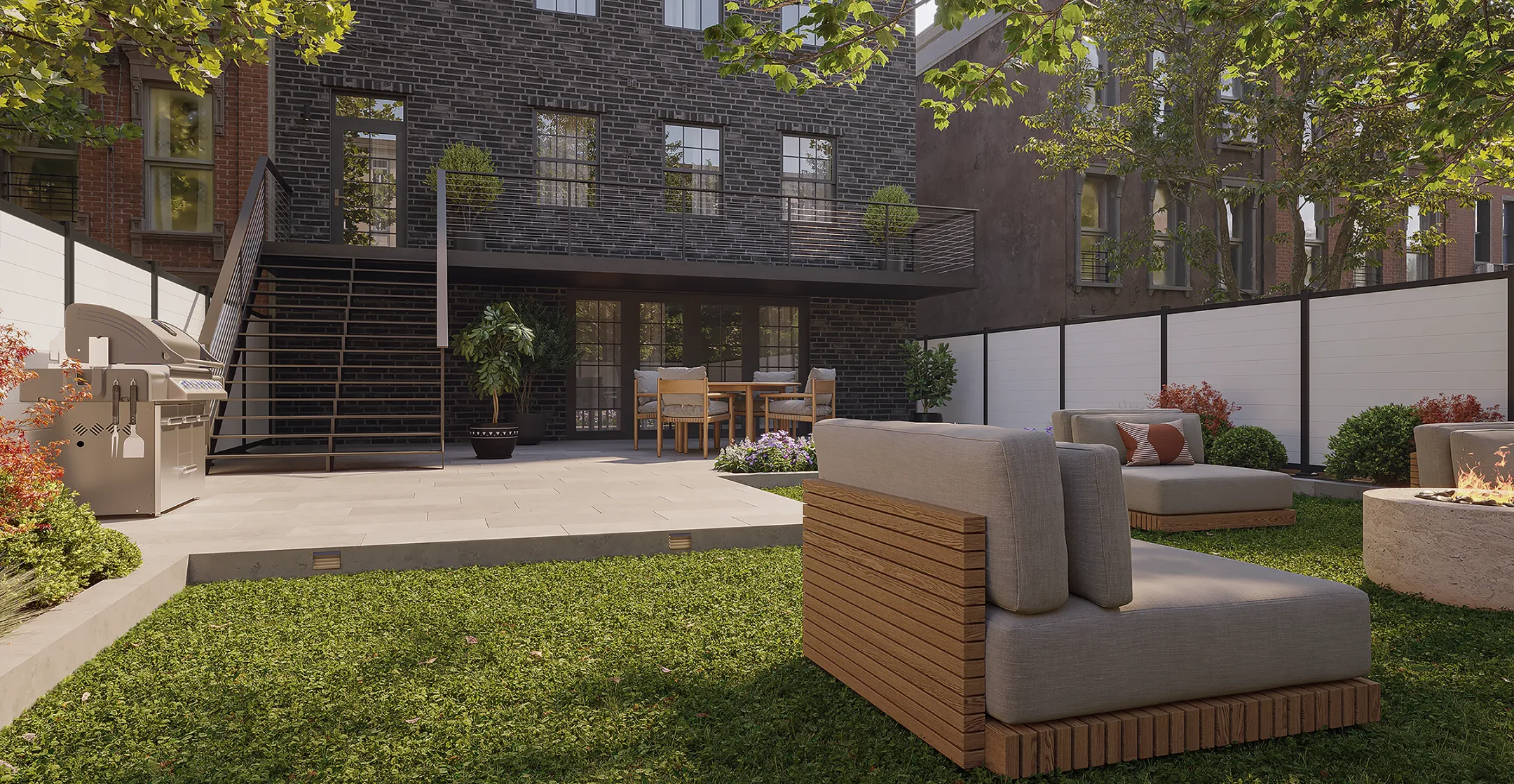 Stylish modern backyard with mixed material privacy fence